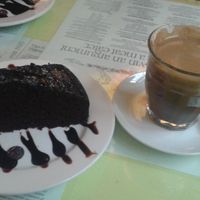 Vegan choc cake and dandelion drink at Bookworm Cafe in Outlying Islands
