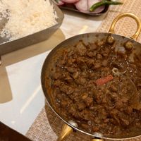 Amritsari Chhole with Basmati and the usual sliced onions and chilis.  at Veg Gulati in New Delhi