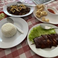(From 12oclock) Pork belly, calamari, and roast duck  at Happy Buddha in Kuta