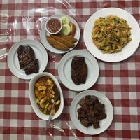 Mock Duck, mock beef jerky, mock fish, stinky beans with fish and fried ricenoodels   at Happy Buddha in Kuta