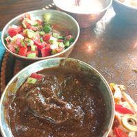 vegan Fesendjan and salad the shirazi at Iranian Artist's Forum - Khaneh Honarmandan Iran in Tehran