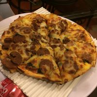 pepperoni pizza (not good pizza) at Iranian Artist's Forum - Khaneh Honarmandan Iran in Tehran