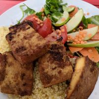 Grilled Tofu with salad and grains at Te'enim in Jerusalem