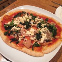Tomato sauce, soy ham, mushroom, spinach, onion and soy milk pizza at Green Earth in Osaka
