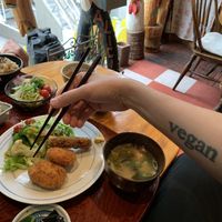 Potato crocketts and my tattoo.  at Alicia in Tokyo