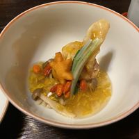 A “dumpling” type thing filled with pumpkin and chrysanthemum sauce   at Fucha Bon in Tokyo
