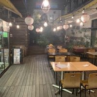 Entrance and outdoor seating at Crayon House in Tokyo