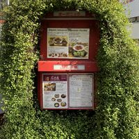 Menu board on street level (restaurant down stairs) at Crayon House in Tokyo