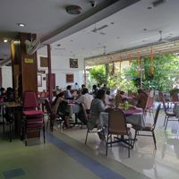 The spacious al-fresco dining area by the garden at Annalakshmi Temple of Fine Arts in Penang