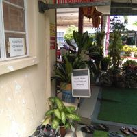 Shoes off policy at Annalakshmi Temple of Fine Arts in Penang
