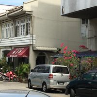 located across from a big blue government building. Just two blocks away from the gateway to Campbell street at Ee Beng Vegetarian Food 毅明素食 in Penang