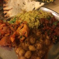 Mixture of the yummy curries with rice and bread at Woodlands Vegetarian Restaurant - Georgetown in Penang