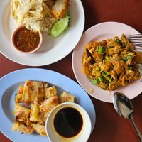 Top left: mock meat and tofu skin
Right: fried glass noodles
Bottom: turnip cake at Chamlong's / The Vegetarian Society Chatuchak in Bangkok