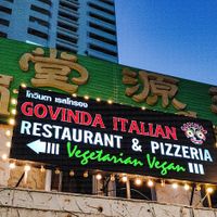 Outdoor signage at Govinda Italian Restaurant & Pizzeria in Bangkok