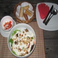 Cesare Salad and included accompaniments 225 baht total. Very nice and good size! at Govinda Italian Restaurant & Pizzeria in Bangkok