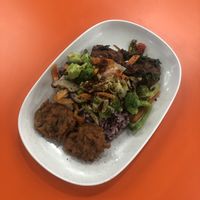 Red rice with 3 toppings, all vegan  at Rabiengboon - MBK in Bangkok
