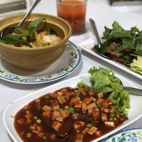 Vegan ham and fish in spicy sauce, vegan seafood curry, vegan nam tok salad at Ruyi Vegetarian in Bangkok