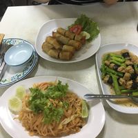 Pad thai, asparagus and tofu, and spring rolls. at Ruyi Vegetarian in Bangkok