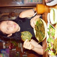 With their signature dish, crispy deep fried leaves! at Aum in Chiang Mai