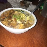 Vegan chicken yellow noodle laksa and vegan chicken drumsticks (vegan)  at Utopia Vegan in Dickson