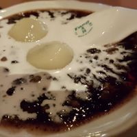 Sesame  balls with black rice sweet dessert at Mother Chu's Vegetarian Kitchen in Sydney