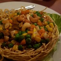 Cashews and cubed vege on crispy noodles bowl at Mother Chu's Vegetarian Kitchen in Sydney