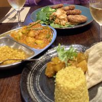 Quinoa croquettes with kimchi, steamed green veg and wasabi sauce; Malaysian curry with dhal and pear chutneyy  at Shakahari in Carlton