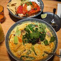 Laksa which is solid and worst the price, and in the background is the burito/enchilada thing - which was very eh. at Vegie Bar in Fitzroy