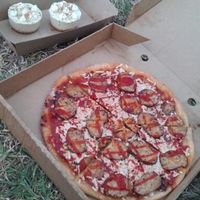 takeaway tempehroni pizza and raw key lime pies at Vegie Bar in Fitzroy