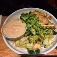 Mostly greens bowl $26.00: great ginger flavour but prefer crunchier veggies, also tahini sauce doesn't complement the dish, tempeh has a soft/fudgy texture at Vegie Bar in Fitzroy