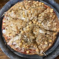 Chickpea pizza with soy cheeze   at Nostralis Wholemeal Pizza in Caulfield North