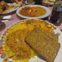 Onion tofu with basmati rice, beans, potatoes and zucchini with curry sauce at Bio Bistro Spicy Spices in Salzburg