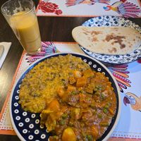Veganes Mango-Lassi aus Soja-Milch 🥭 at Bio Bistro Spicy Spices in Salzburg