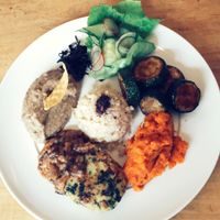 dish of the day with millet burger and puréed carrots  at Den Teepot in Brussels