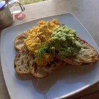 Tofu scramble & avo 💚 at Infinity Foods Kitchen in Brighton