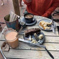 Our food (excuse the hacked up cake!)  at Wai Kika Moo Kau in Brighton