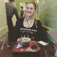 me at the rainbow cafe with my vegetarian lasagne at Rainbow Vegetarian Cafe in Cambridge