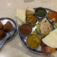 Thali extravarganza and  samosa (not fully vegan, I shared it with a non-vegan)  at Govinda's in London