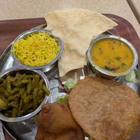 Vegan platter with samosa and puri at Govinda's in London