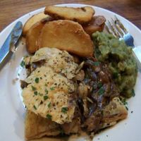 mixed mushroom, porcini, and ale pie served with fries and mushy peas at Mildreds - Soho in London
