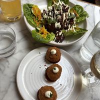 Absolutely incredible arancini and cauliflower cups - could’ve eaten buckets of these 😩  at Mildreds - Soho in London