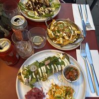 salsa verde burrito, teriyaki cauliflower and loaded nacho friess  at Mildreds - Soho in London