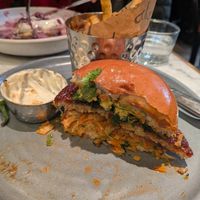 Korean chkn burger and berries/cream pancakes (in the back) at Mildreds - Soho in London