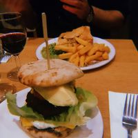 Mexican black Bean and sweet potato burger with chilli, sweetcorn relish, tomatillo coriander mayo, lettuce, onion and additional avocado and vegan cheese  at Mildreds - Soho in London