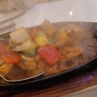 Sizzling black bean sauce with tofu at Loving Hut in North London