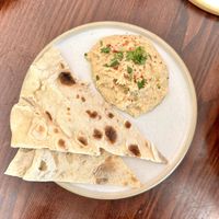 Lemon hummus and flatbread  at Greens in Manchester