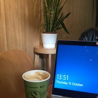 Coffee in the cafe  at The 8th Day in Manchester