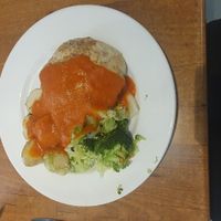 Main: Cheese & chard pie. Sides: Steamed seasonal greens in lemon juice & cracked black pepper, pan-fried new potatoes with red pepper sauce. at The 8th Day in Manchester