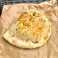 Tofu and mushroom calzone  at The 8th Day in Manchester