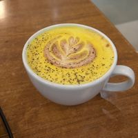 Turmeric latte with coconut milk at The 8th Day in Manchester